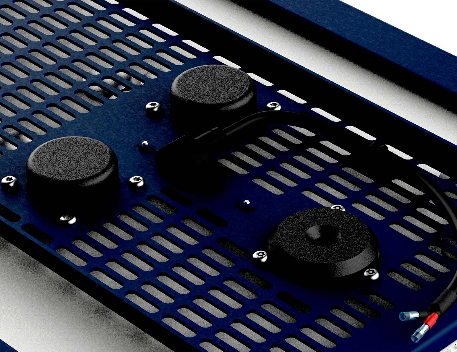 Close-up of an Amina invisible speaker panel showing the driver mounted behind the surface before plastering