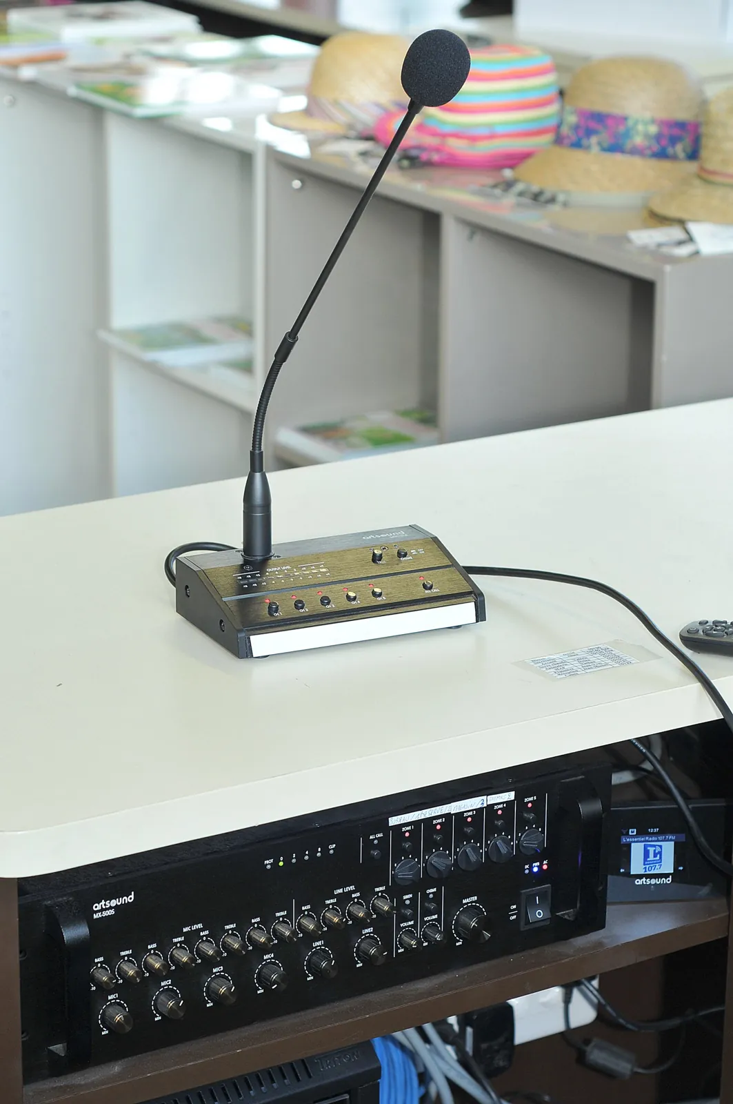 Artsound MX-5006M mixing amplifier with a zone paging microphone in a retail shop
